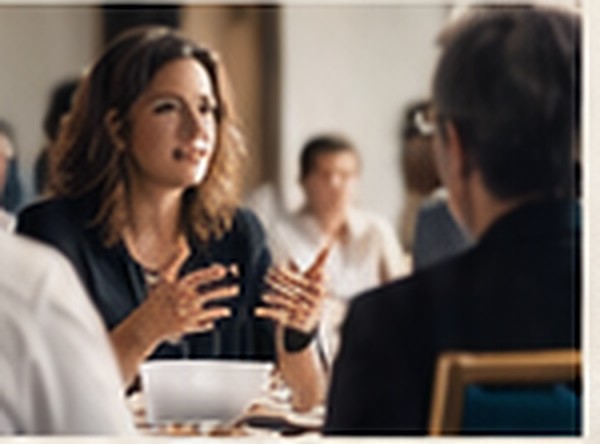 Leaders in conversation at a professional gathering